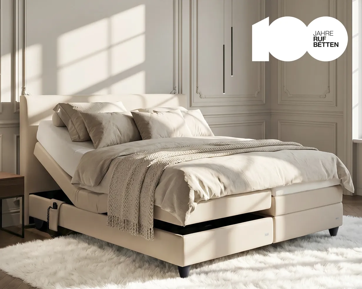Motor-Boxspringbett Movida von RUF Betten in einem hellen Schlafzimmer